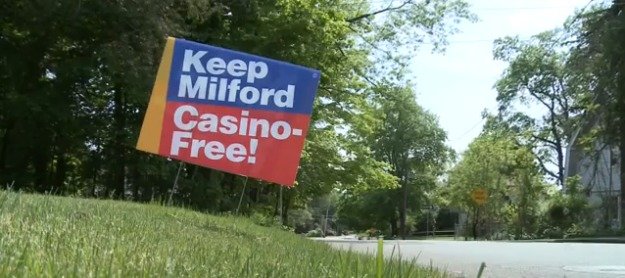 A billboard against the expansion of gambling in Milford