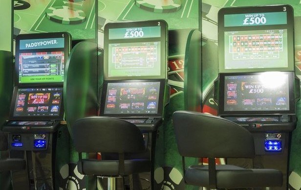 Fixed odd betting terminals in a Paddy Power shop Fixed odd betting terminals in a Paddy Power shop
